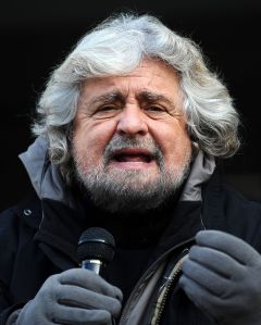  Beppe Grillo on the tribune of the Five Star Movement at Piazza Dante in Trento during the collection of signatures for the presentation of the lists for the political elections in 2013. (by Niccolò Caranti)