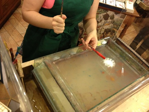 She starts with the glue-like gel as a base